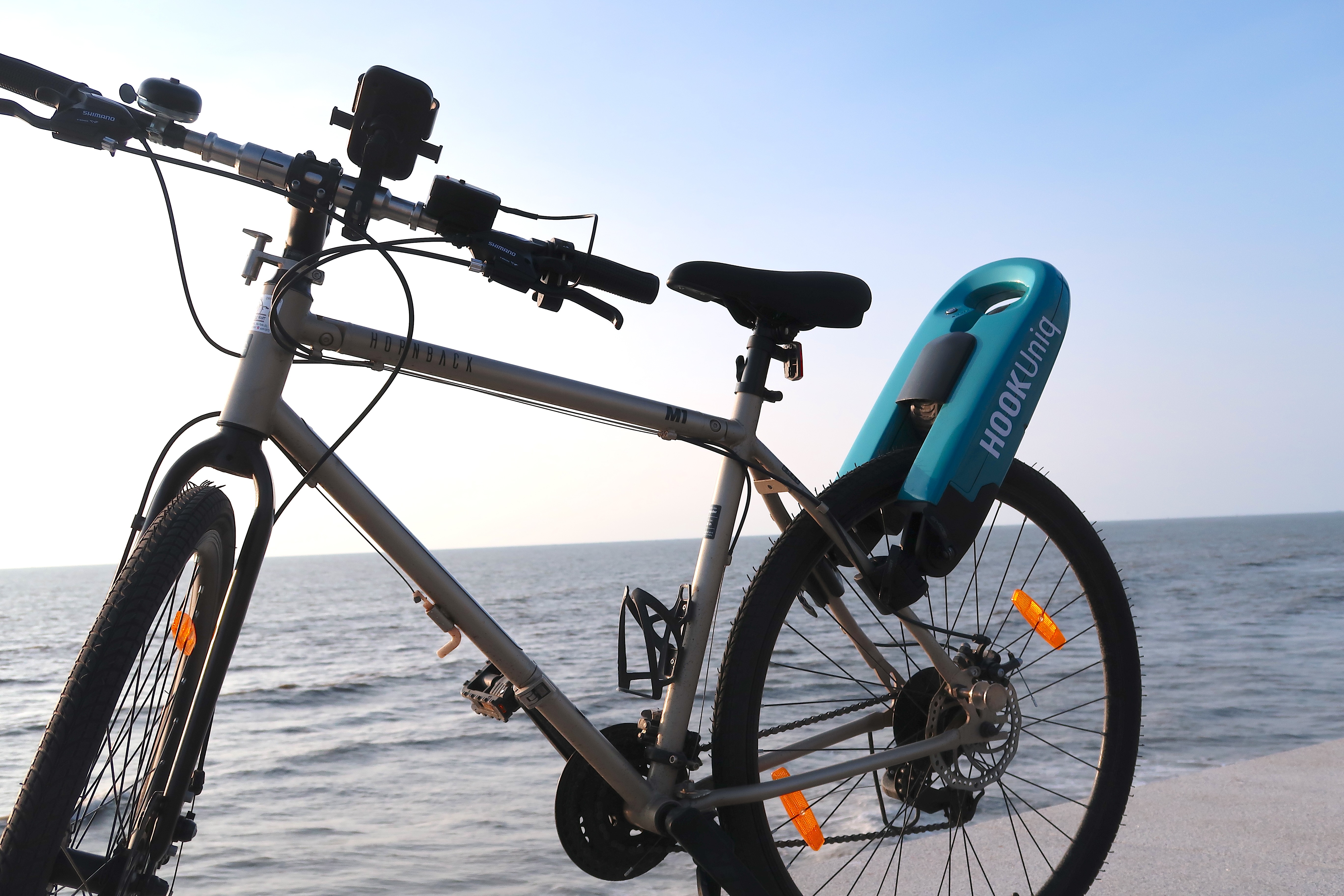 The same HOOK unit fitted to a road, mountain, city and folding bike